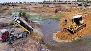 Start Opening new Project Processing Dump truck with Dozer KOMATSU DR51PX Push soil to clearing land