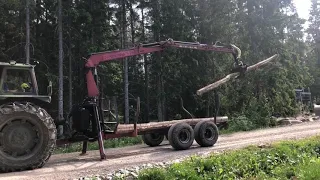 Köp traktor BM650 med timmervagn på Klaravik