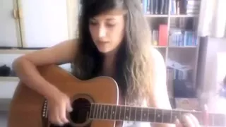 The girl is very beautiful singing and playing guitar  Девушка очень красиво поет и играет на гитаре