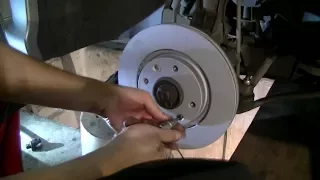 Replacing front brakes on a Peugeot 206 CC