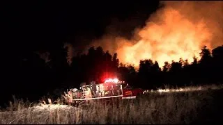 Crews battle early morning brush fire in Lee County