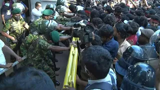 Sri Lanka students mob PM's home over economic crisis | AFP