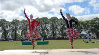 Champion Highland dancers in the Highland Fling during 2022 Oldmeldrum Highland Games in Scotland