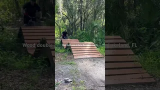 Sweet wood double mountain bike jump at Carter Road trails in Lakeland, FL