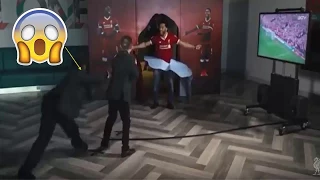 Mohamed  Salah bursts through wall to surprise kids