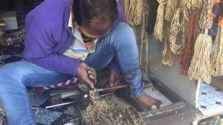 Hand crafting Tulsi Beads