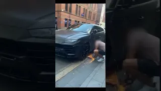 man filmed cutting clamp off Lamborghini with angle grinder