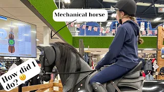 Trying out a dressage horse simulator