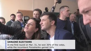 Ukrainians vote for president in run-off between incumbent, comedian