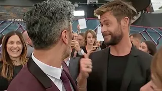 Chris Hemsworth cheekily interrupts Taika Waititi's interview