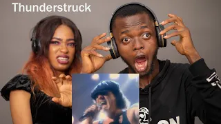 OUR FIRST TIME HEARING AC/DC - Thunderstruck (Official Video) REACTION!!!😱