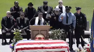 Detective sings Amazing Grace at funeral for KCK Det. Brad Lancaster