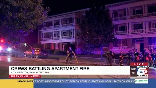 Kansas City firefighters rescue 2 on balcony after apartment fire