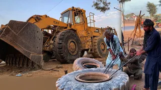 Changing Caterpillar Wheel Loader Big Tires Using Talcum Powder Method and Without Any Power Tools