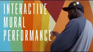 Performance on interactive installation mural