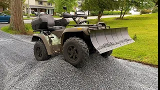 Spreading Gravel In A Driveway With An ATV