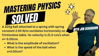 Mastering Physics Solved!  A 200g ball attached to a spring with spring constant 2.50 N/m oscillates