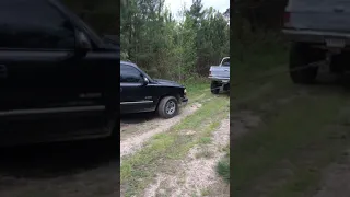 Lifted K5 Blazer drags crackheads parked truck through the mud off of private property