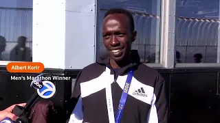 New York Marathon winners celebrate at Empire State