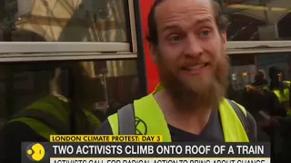 Climate change protests in London: Protesters glue themselves to train