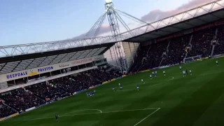 Leeds United fans signing 'Its all gone quiet over there!' to Preston North End fans 2017