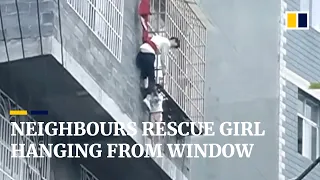 Neighbours rescue girl hanging from fourth-floor window in China