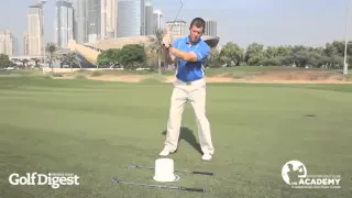 Improve your golf swing with Pete Cowen's Axe Drill