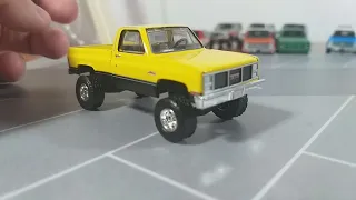 Different kinds of squarebody trucks made by Greenlight