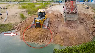 Incredible Build New Road On Water by Operator Bulldozer Pushing Stone With Dump Truck Unload Stone