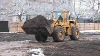 Cat 966C dumping stone