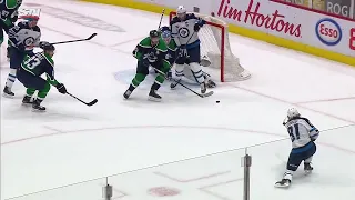 Demko denies Connor with the lunging glove save