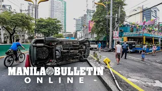 A car flipped on its side after driver fell asleep and hit a light post in a gutter in Lerma, Manila