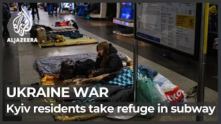 Ukraine war: Kyiv residents shelter in subway amid Russian bombing