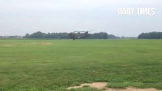 Chinook landing and then taking off backwards