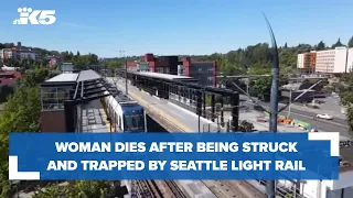 Woman dies after being struck, trapped by Seattle's light rail