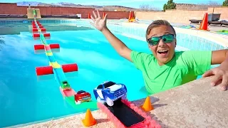 We Built a Giant Floating Electric Car Magic Tracks Bridge to Cross the Water!