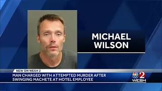 Man charged with attempted murder after swinging machete at hotel employee