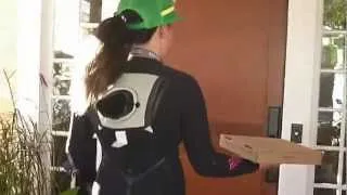 Wetsuit girl! The pizza delivery man