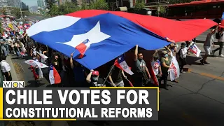 Authorities sanitize polling stations as Chile goes to polls after protests | Chile Polls