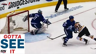 GOTTA SEE IT: Jake DeBrusk Makes Diving Redirect To Score First Goal Of Playoffs