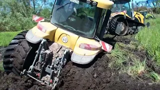 Tractors John Deere  in the mud!