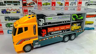 12 Type Tomica Cars ☆ Tomica opening and put in big Okatazuke convoy(yellow color of the sun)