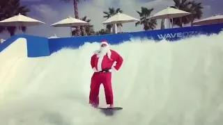 Santa on the FlowRider WaveOz Surf Machine in Dubai at Laguna Waterpark