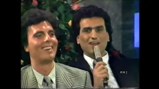 (1987). Sanremo '87, con Pippo Baudo. Un telespettatore chiede a Toto Cutugno perché è così serio.