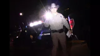 Texas Trooper loses the flashlight battle.