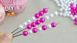 I made 50 in one day and Sold them all! Super genius idea with pearl bead and yarn