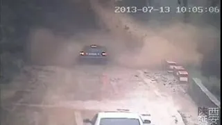 China Landslide Smashes CAR On Roadway CCTV Dramatic Footage Of Landslide Miracle