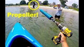 Electric Drill Powered Propeller Paddle on a Tiny Kayak in Portland Maine at Willard Beach