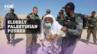 Elderly Palestinian man pushed away by Israeli soldiers