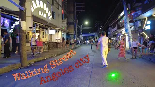 ANGELES CITY. WALKING STREET. SATURDAY NIGHT.